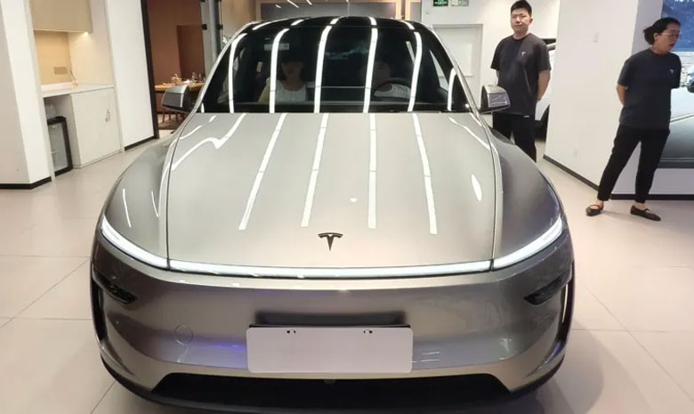 Tesla profit drops as record sales meet tariffs and rising R&D spend